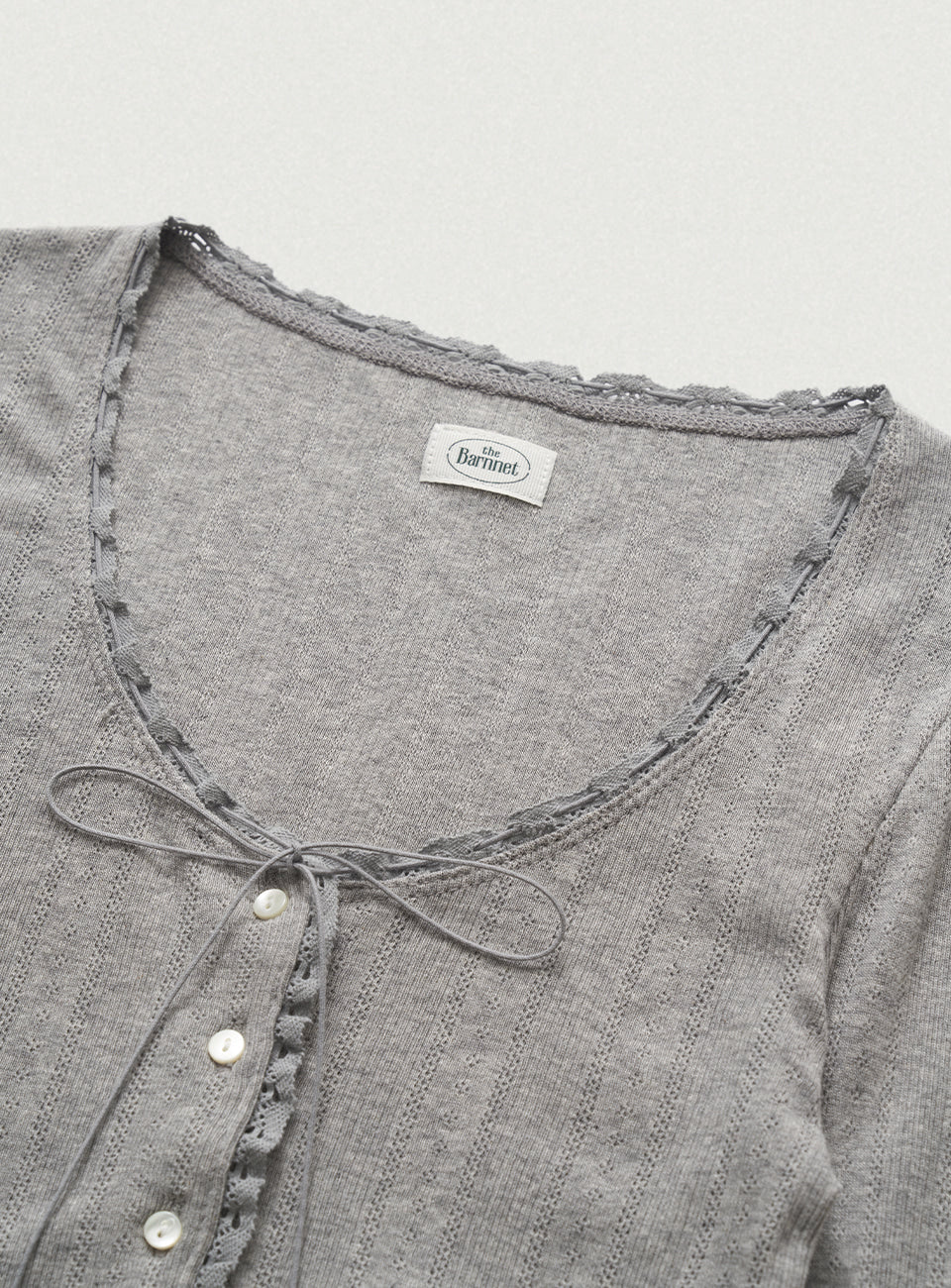 the Barnnet Grey Ravioli Lace-Trim Button-Up Top – Elegant
