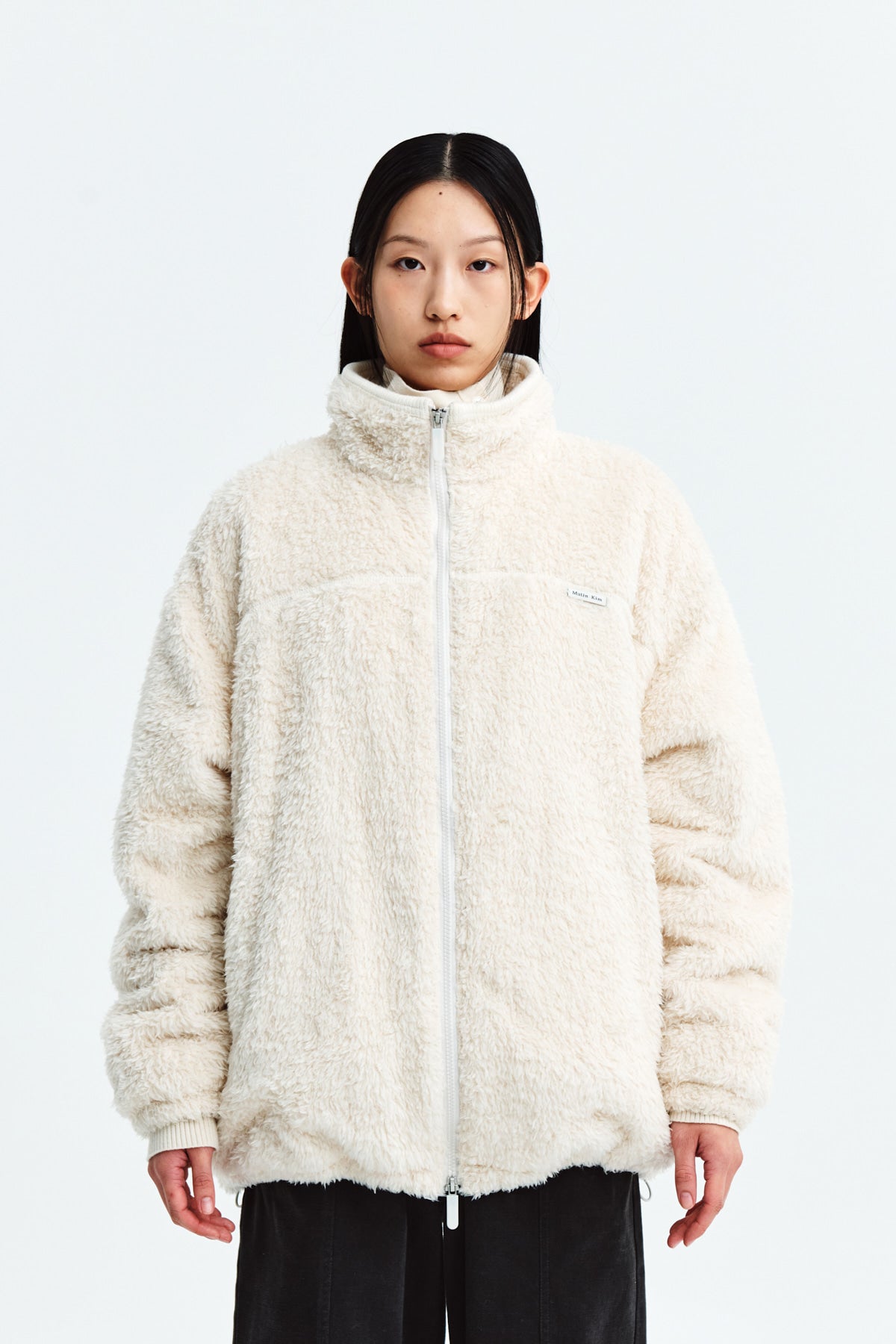 フリースジャケット [MATINKIM]back logo fleece jumper for women in ivory MATIN KIM BACK LOGO FLEECE JUMPER FOR WOMEN IN IVORY