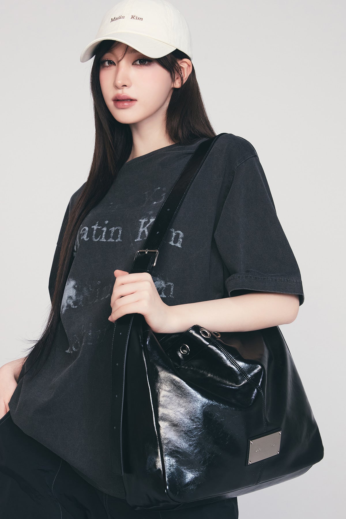 MATIN KIM MATIN EYELET POINT LAYERED BIG SHOULDER BAG IN BLACK
