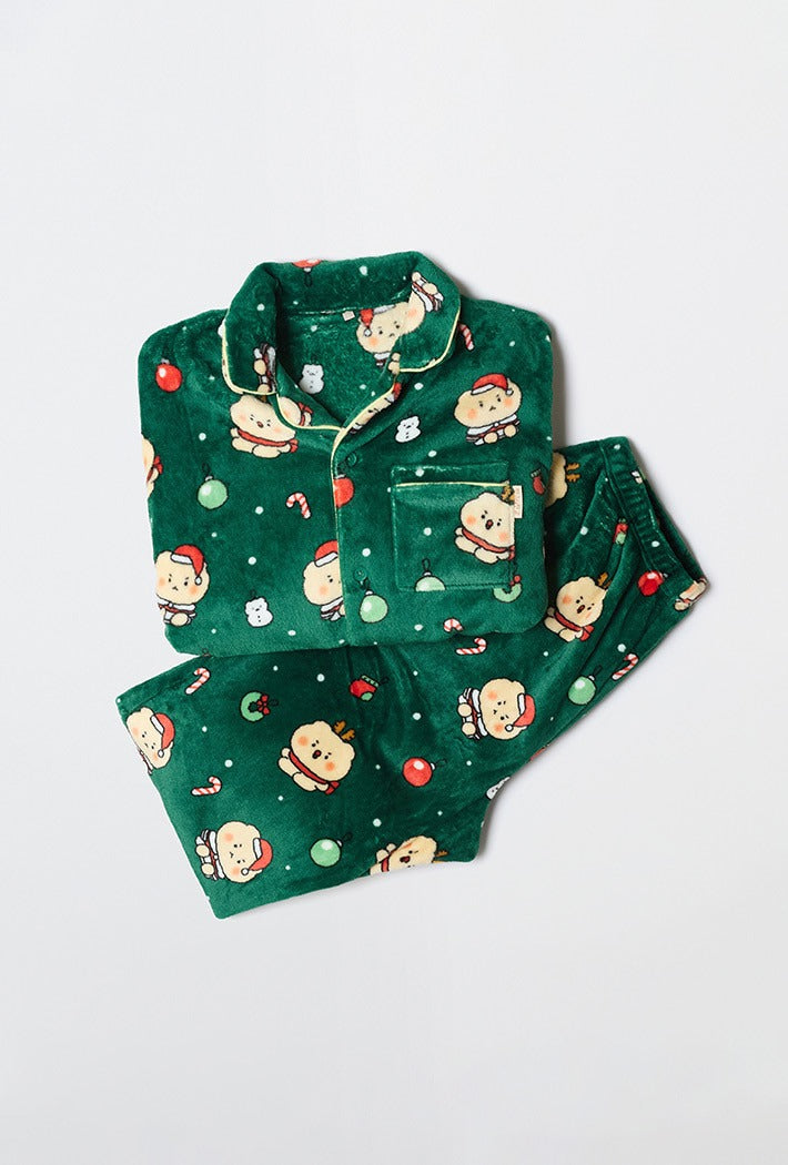 Green pajama set with cartoon characters on a light gray background