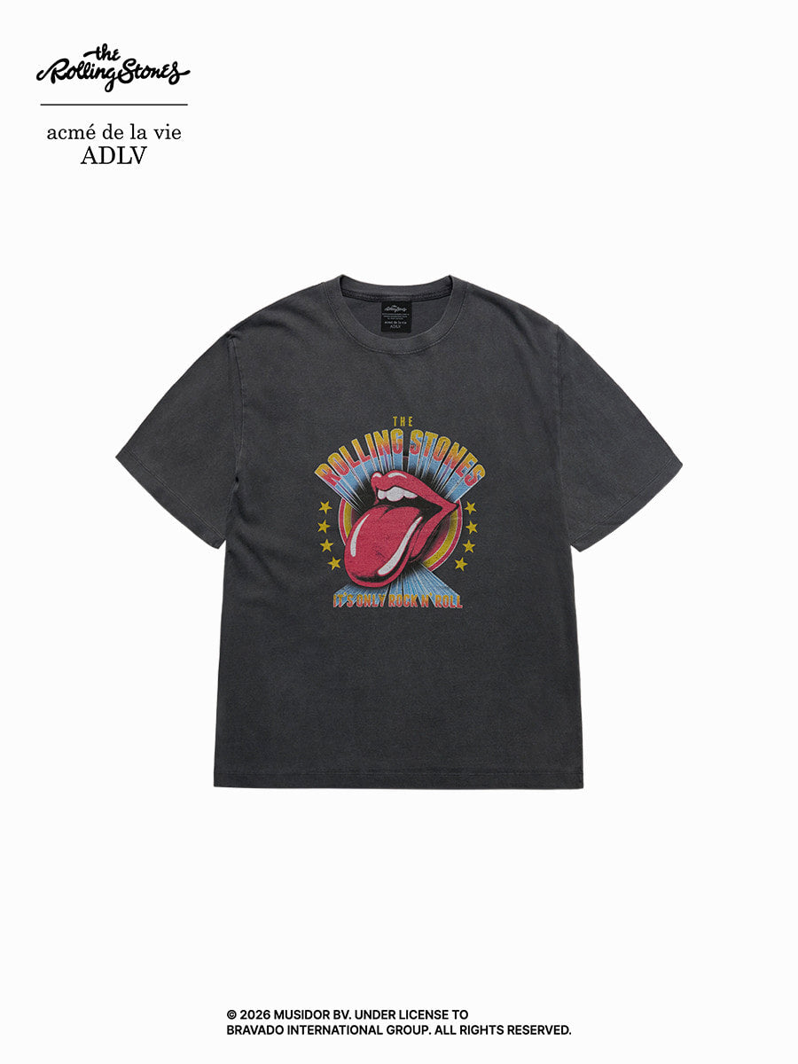 A dark gray washed t-shirt featuring a colorful graphic print of The Rolling Stones' lips and tongue logo with the text 'ROCKIN' MAN II (1970)' on the front, displayed against a plain white background with brand text overlays.