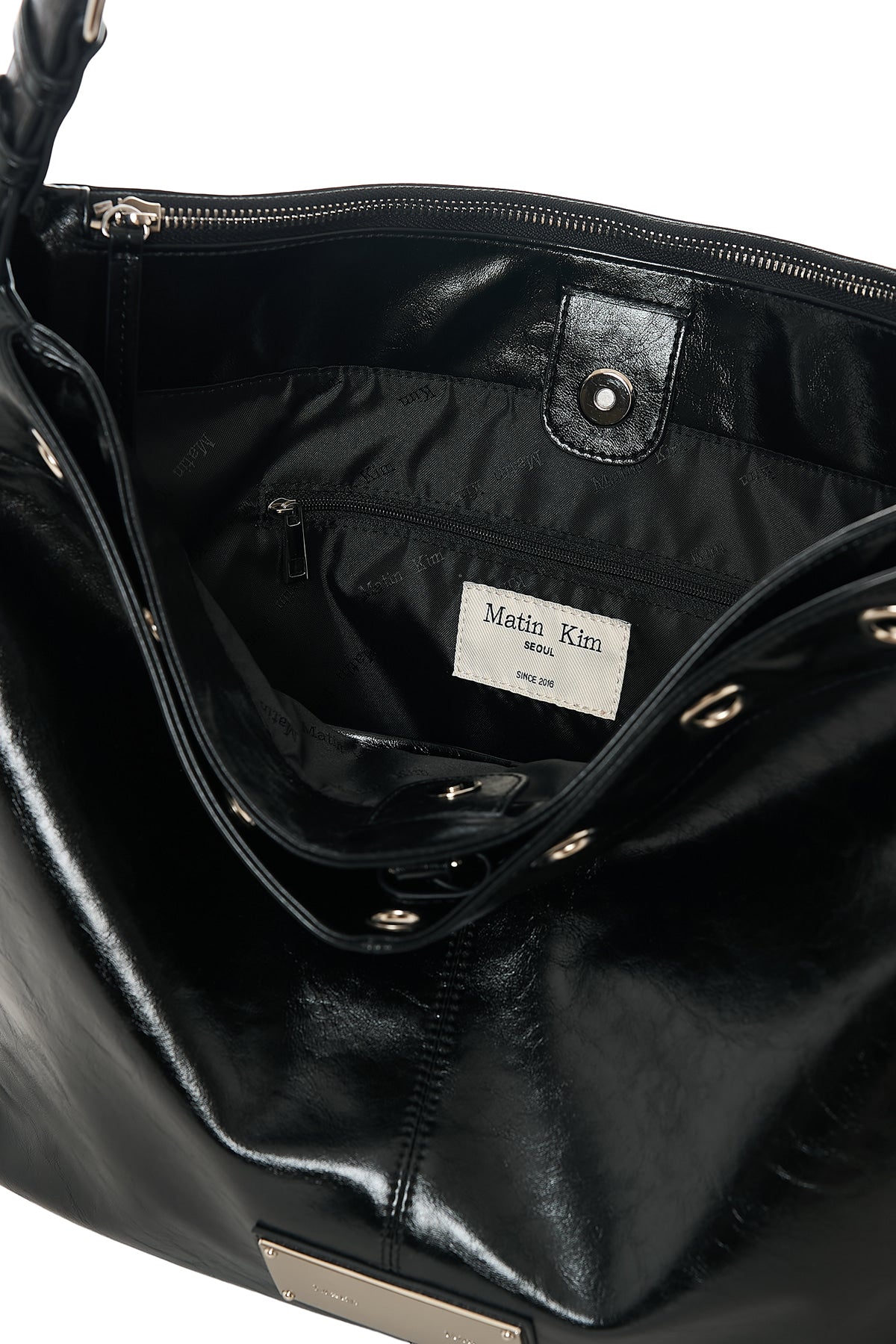 MATIN KIM MATIN EYELET POINT LAYERED BIG SHOULDER BAG IN BLACK