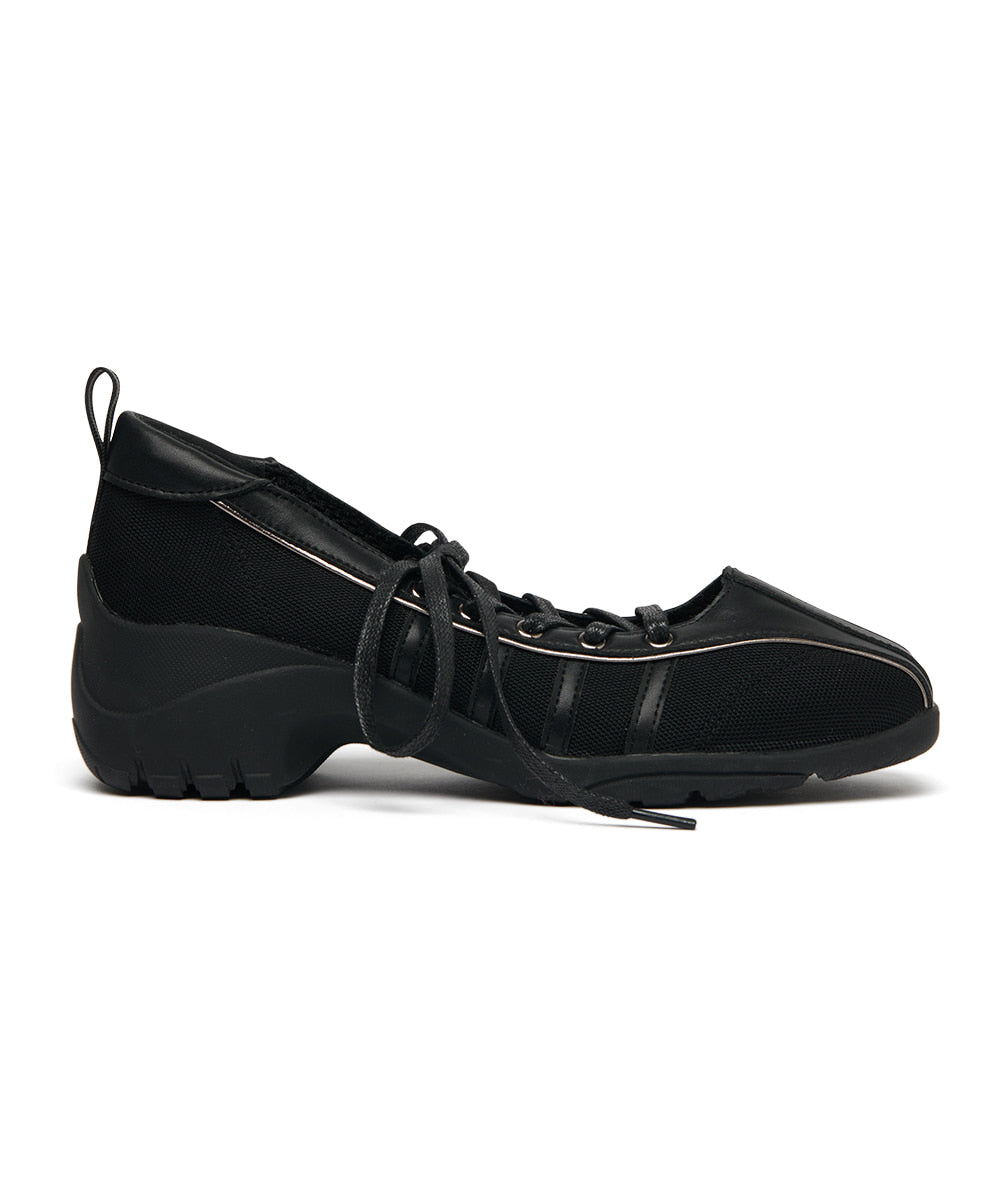 Black suede shoe on a white background