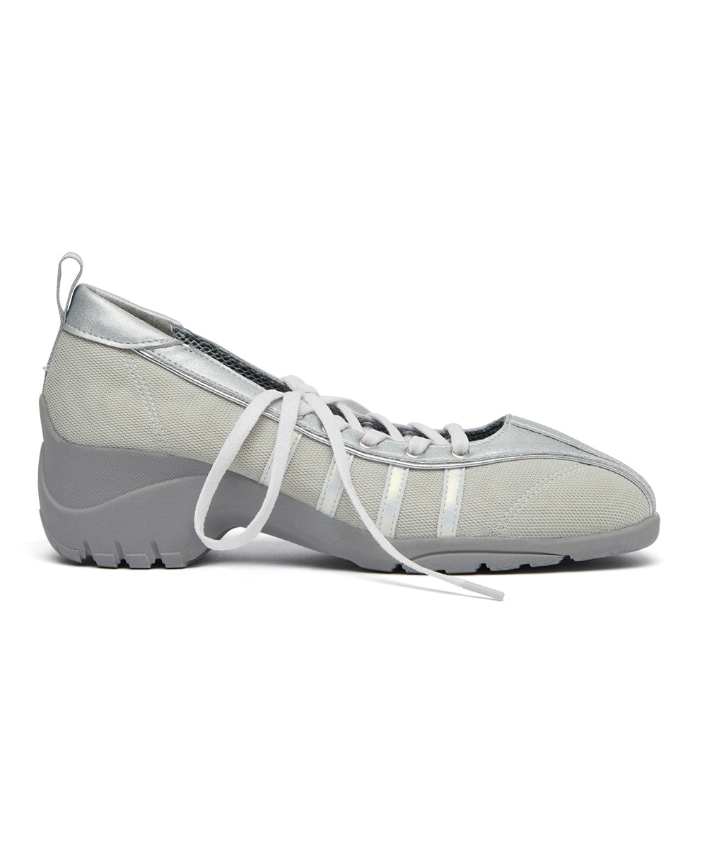Gray ballet shoe with white laces on a white background