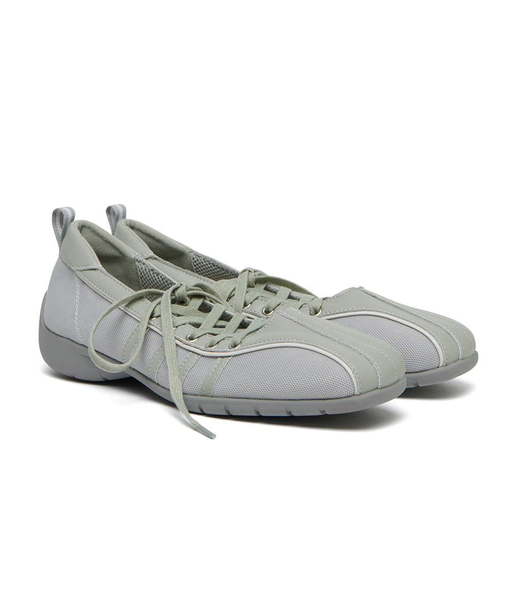 Pair of light gray sneakers on a white background