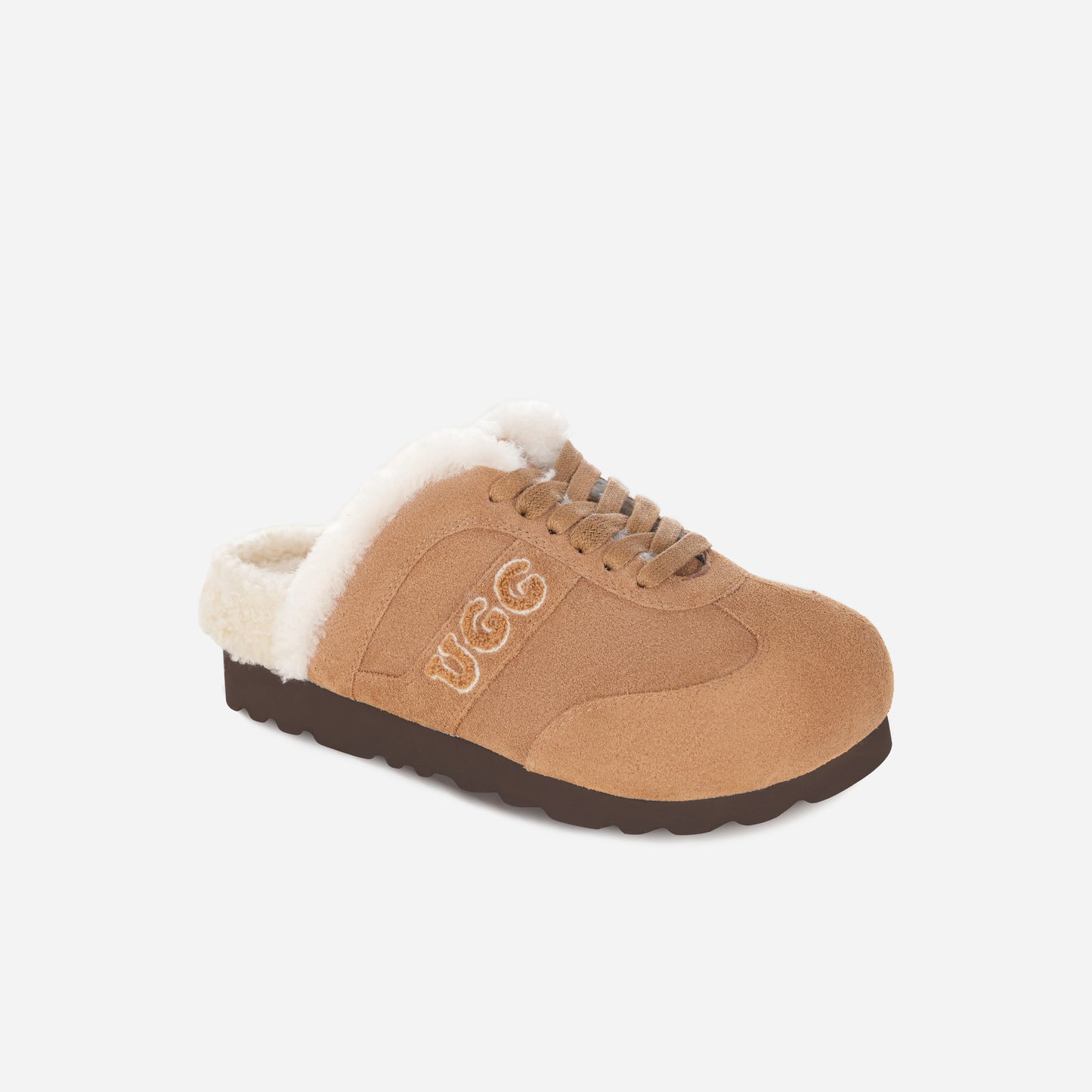 Tan UGG slipper with white fur lining on a white background