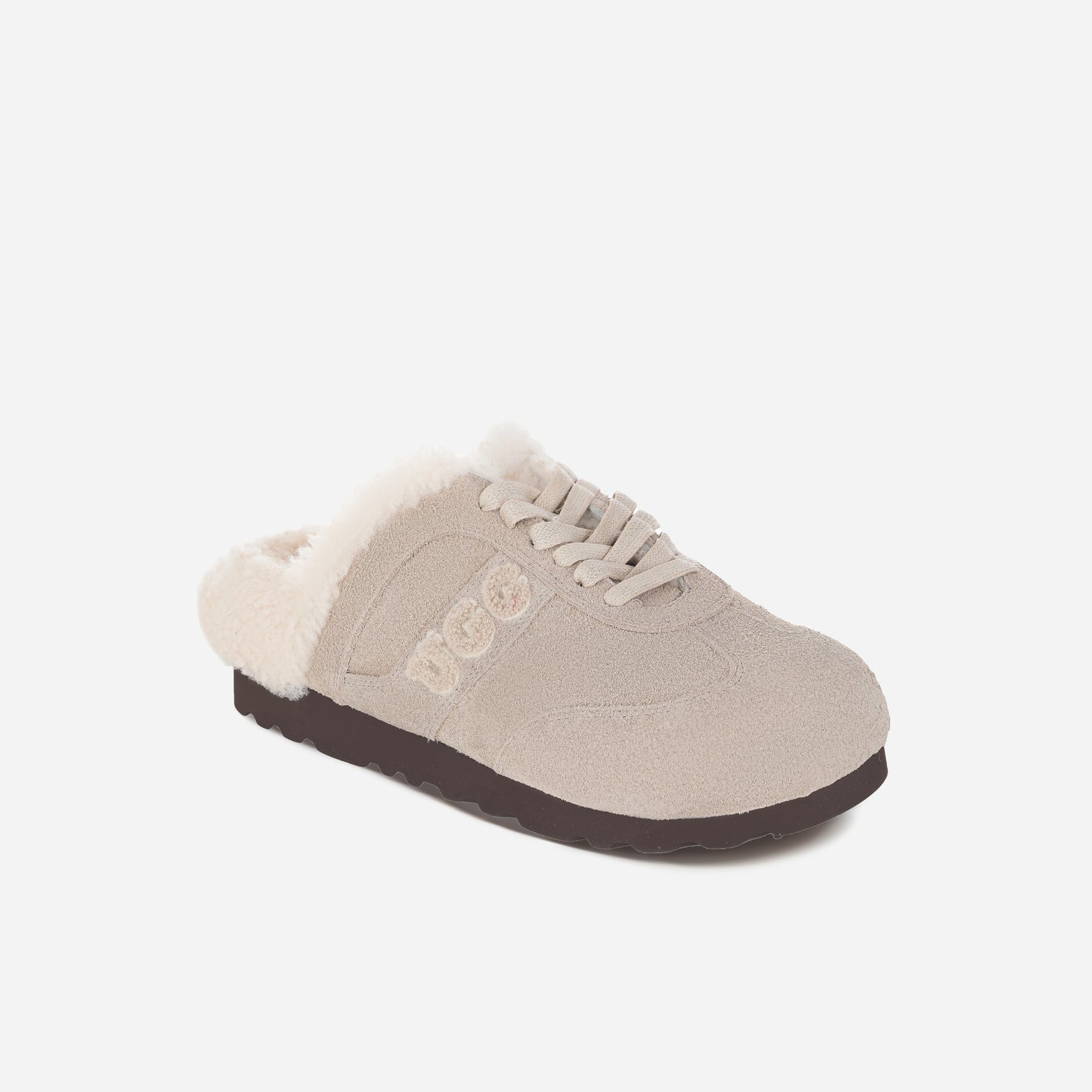 Beige slip-on shoe with white lining on a light gray background